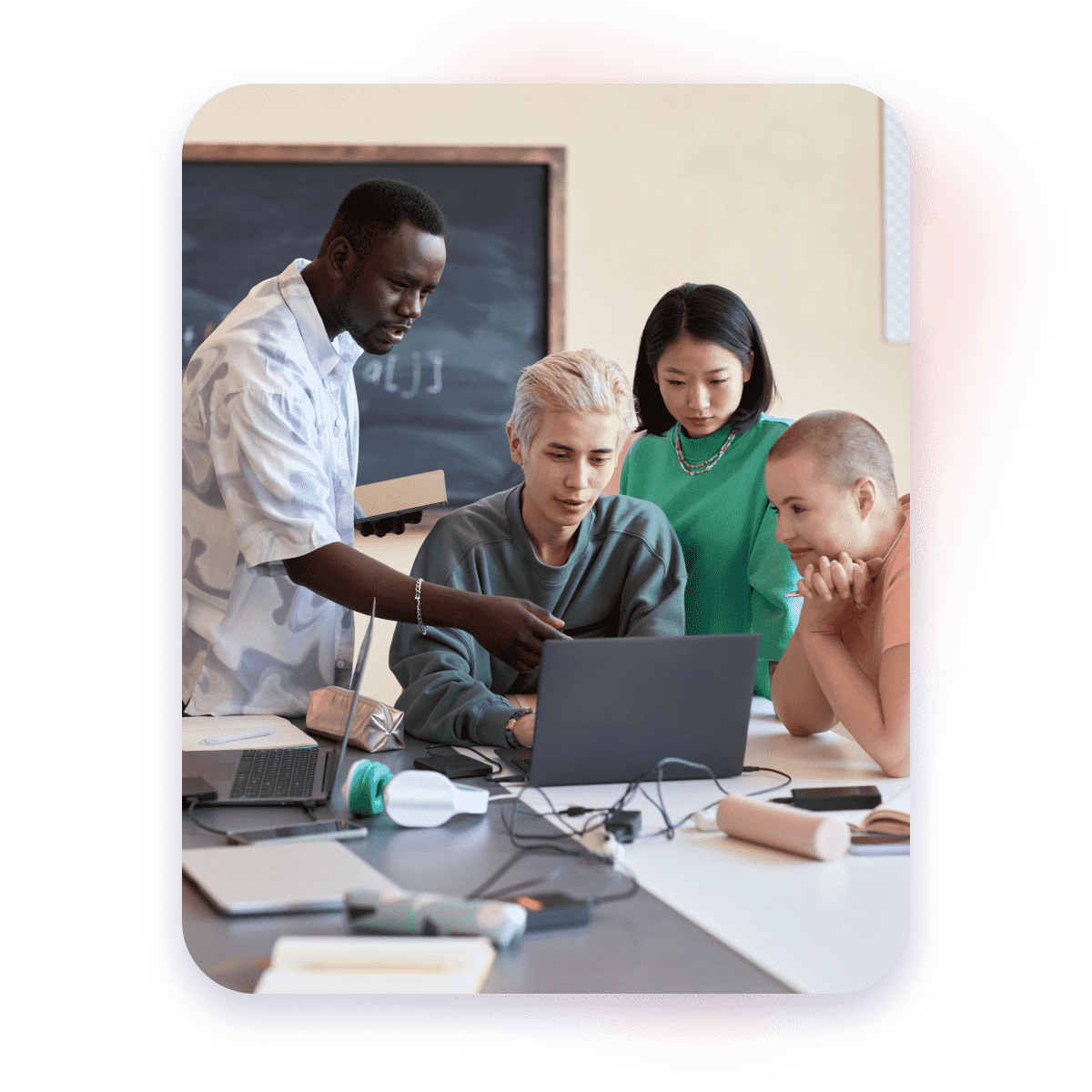 Group of students working on a project with a computer